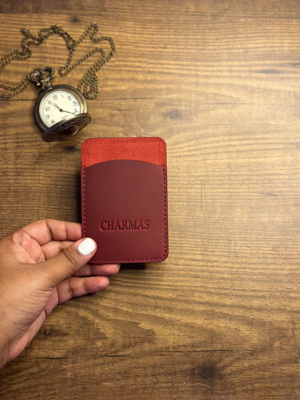 Leather card holder showing compact size and card storage
