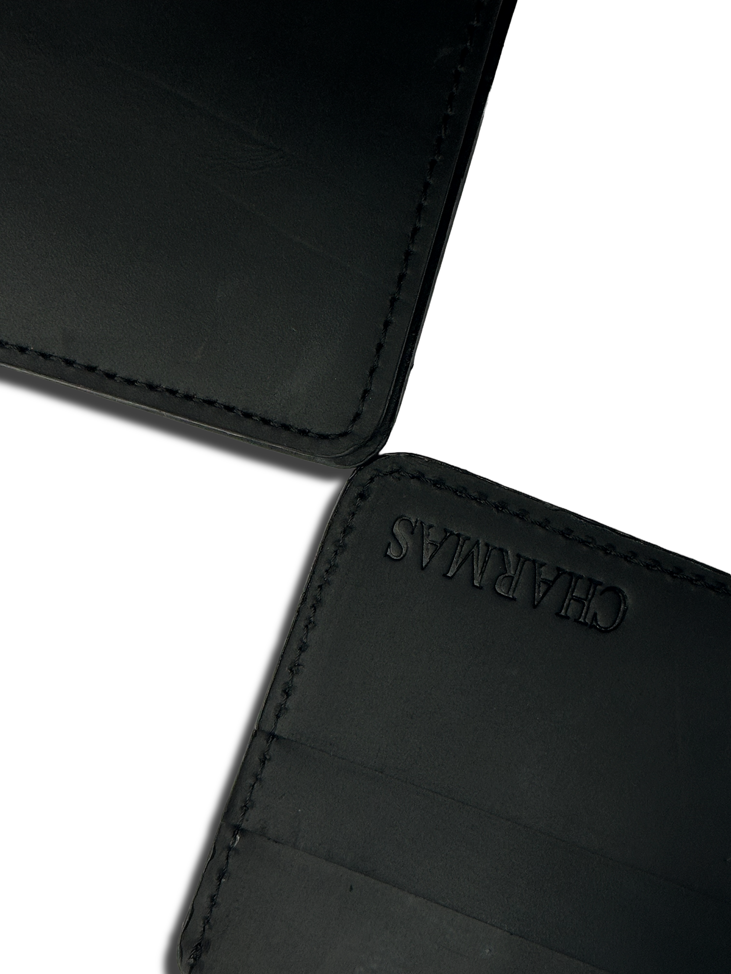 CHARMAS black bi-fold wallet front view with signature embossing**